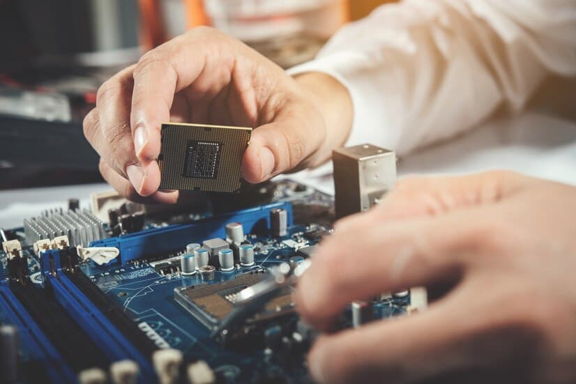 Technician Repairing the Computer