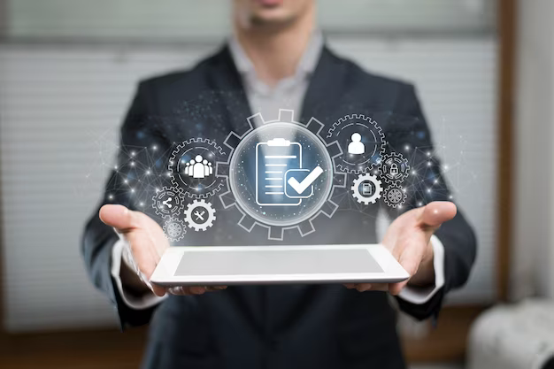 A man holds a tablet on top of which the concept of data management